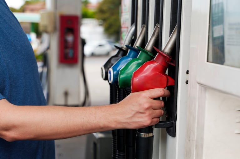 Man filling car at gas station